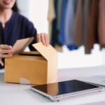 entrepreneur packing a cardboard box for e commerc 2026 07 08 22 43 47 utc 1920x1281 1